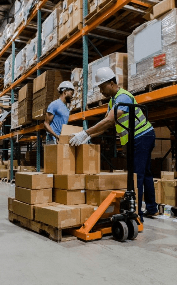 Warehouse team handling cargo boxes